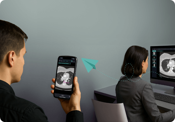 Female radiologist at a desktop reviewing a CT scan in the Rapmed DICOM viewer with integrated chat, while a colleague behind her uses a smartphone to view the same case